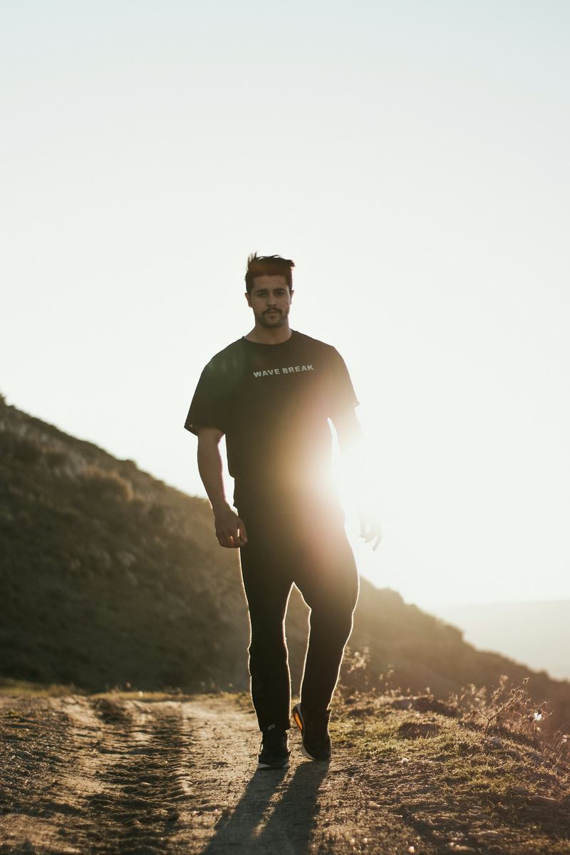 Daniel hiking at golden hour